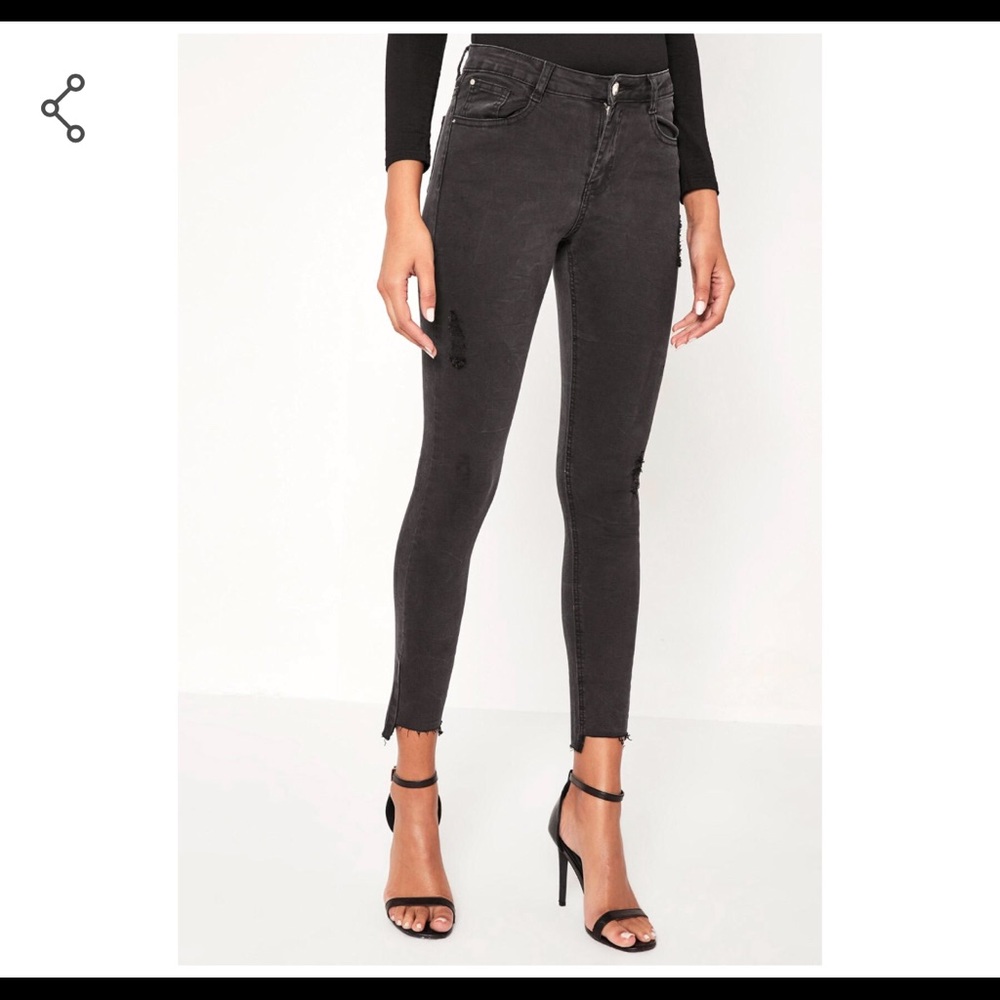 Black mid rise distressed jeans